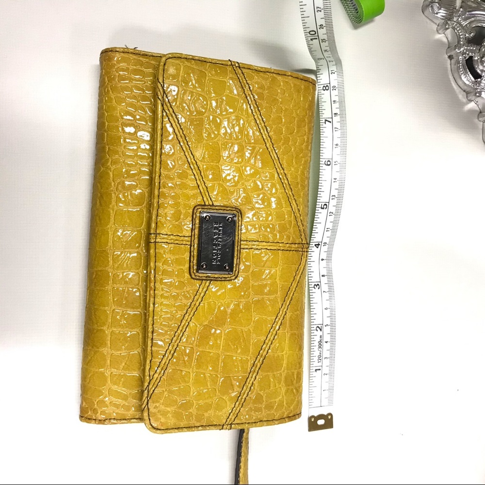 COPY - Trifold faux leather wallet.